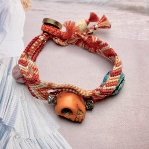 Woven bracelet with skull